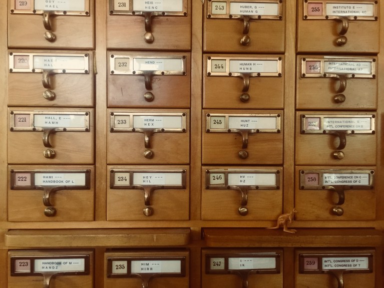 an old school wooden card catalog